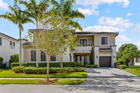 Photo of 10470 S Lago Vista Cir, Parkland, FL 33076 (MLS # A11876874)