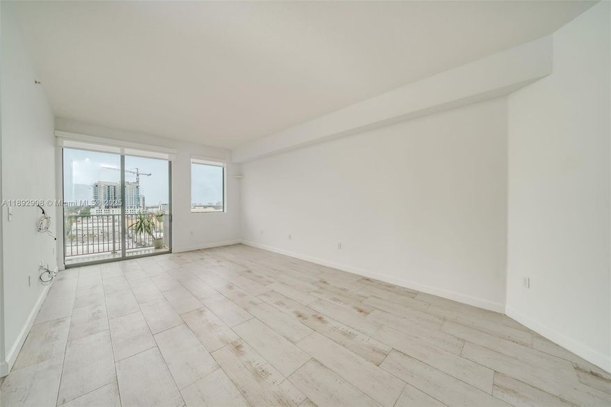 Highest floor in condo / PH FLOOR. Offers high ceilings, front load laundry set, stainless steel appliances, granite counter top in kitchen, central air conditioning, impact windows, upgraded porcelain tile with wood look and upgraded window treatment. Large wrap around balcony that overlooks Hollywood, far ocean front view, fort lauderdale, Aventura and more. Amenities upgraded. Walk to all shops, stores, galleries & supermarket.  15 Min from Hospitals, Airport, Aventura, and Fort Lauderdale.