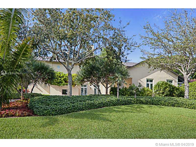 JUST REDUCED! VACANT, GREAT OPPORTUNITY FAMILY RELOCATING, WAITING FOR YOU!!! Very private,custom designed by world-renowned Arquitectonica. Open, bright,clean lines,custom built w/5,230 sq. ft. of living area. Foyer entrance,living rm,dining rm,library,large terrace framing lap pool & beautiful landscape. Spacious kitchen w/large seating counter, open to huge family rm. 3 bdrms, 3.5 baths + large 2 car garage w/storage area downstairs. Upstairs is master bdrm & bthrm, + adjacent sitting area w/wall to wall closets. 1 more bdrms & bthrms complete the 2nd flr. All impact windows & doors.Flood Zone X, no flood insurance req. Cocoplum Section 1, incl. guard gated entrance, 2 tennis courts & Coral Gables Police Roving Patrol, voluntary HOA. A unique combination of space & design.Easy to show!