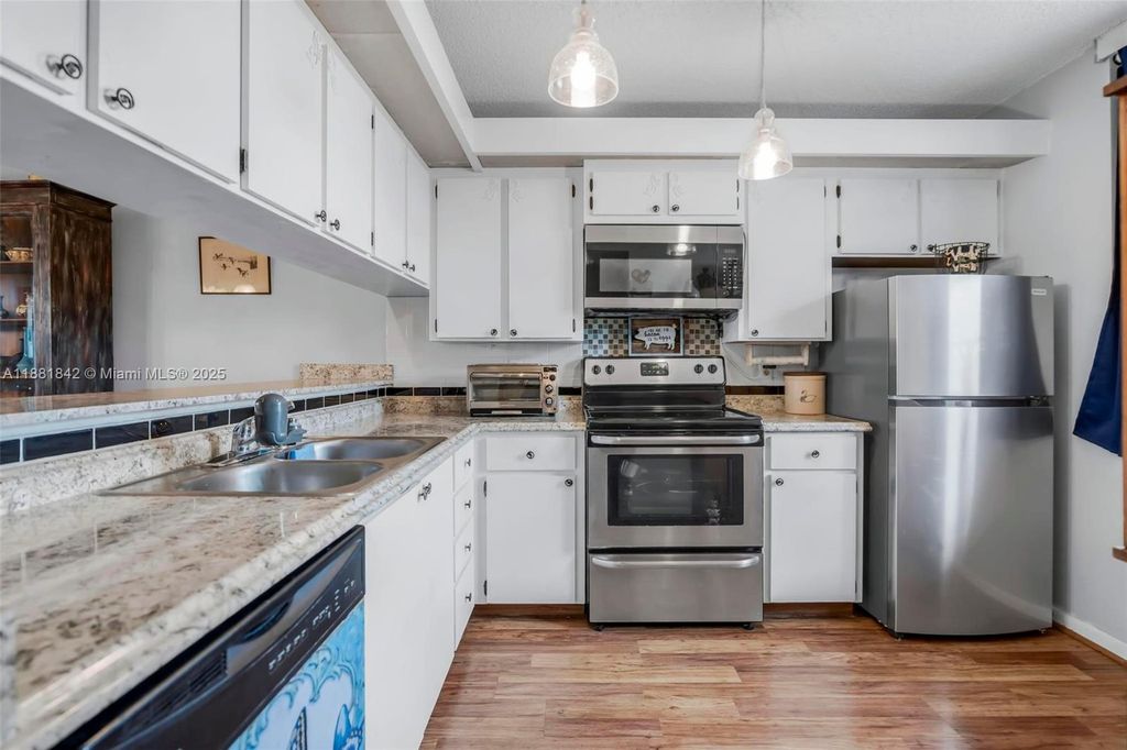 Photo of 3826 Whitehall Dr #405, West Palm Beach, FL 33401 (MLS # A11881842)