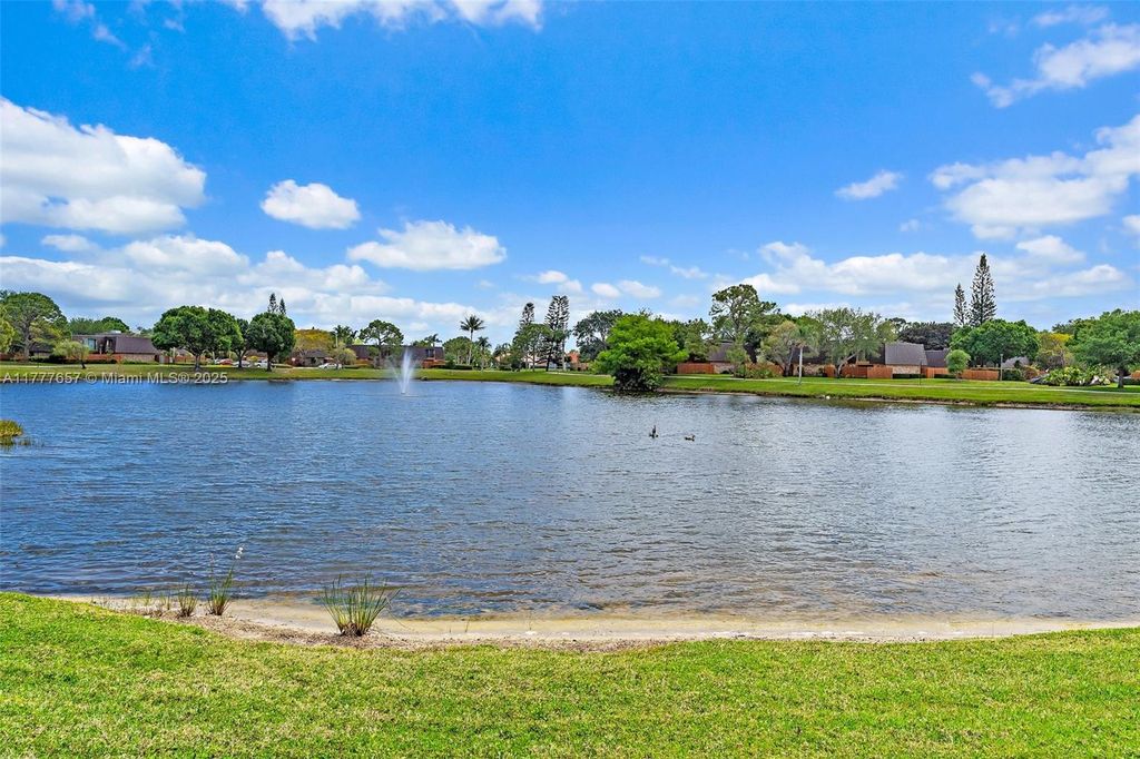 Photo of 5830 SE Windsong Ln #206, Stuart, FL 34997 (MLS # A11777657)