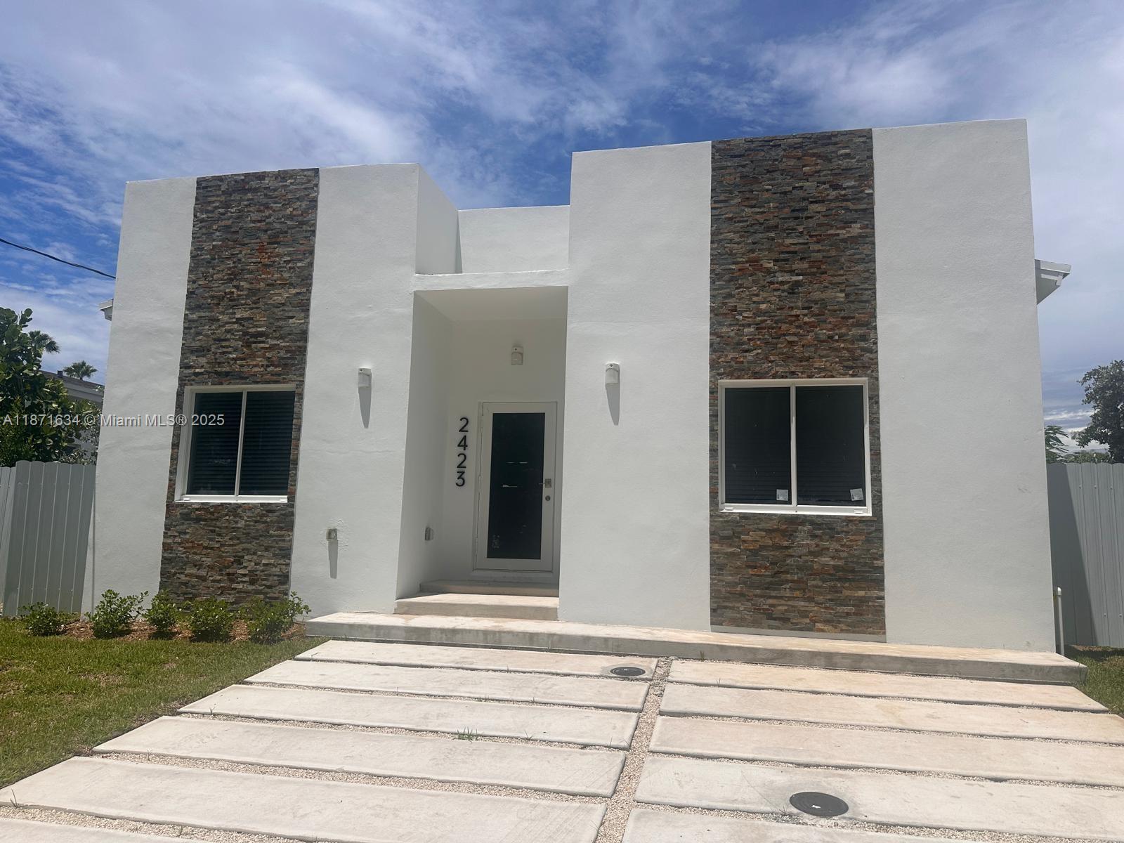 New construction modern single-family home featuring 4 bedrooms, 2.5 bathrooms, and a spacious backyard. Conveniently located in Fort Lauderdale, close to shopping centers and major roadways. This beautiful home offers open, light-filled spaces designed for everyday comfort and enjoyment with your family.