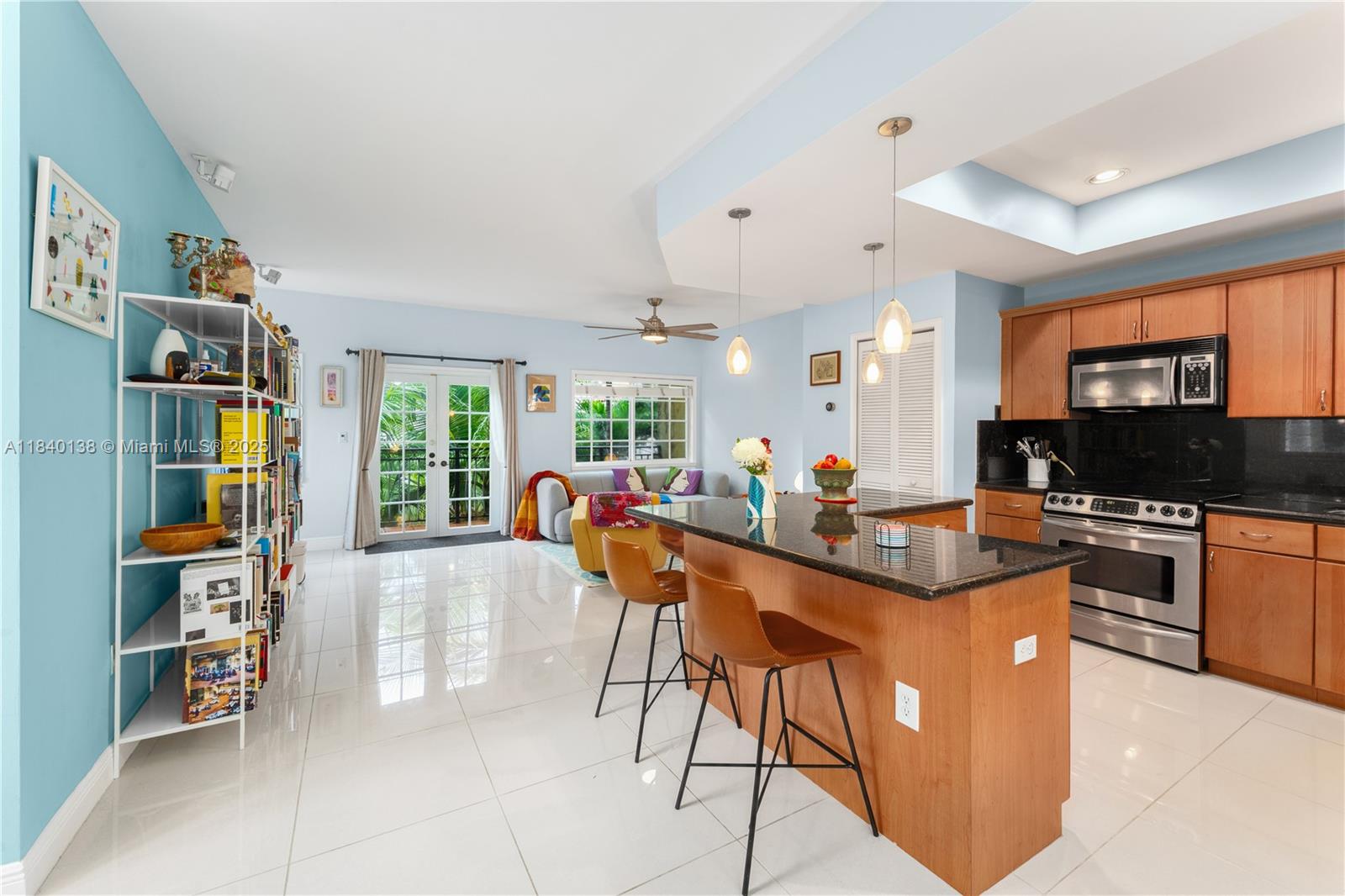 Ideal Coconut Grove living! Located on one of its most lush & desirable streets, this tri-level renovated corner townhome offers a comfortable & luxurious lifestyle including high ceilings, impact windows & doors, multiple balconies & an inviting and open living space. This 2-Bed/2.5-Bath townhome features a massive 2-car garage (over 400 SqFt) w/ plenty of storage, spacious eat-in kitchen w/ island seating, incredible natural light, large white porcelain tiles (24x24) + bamboo wood floors in bedrooms. Located in a private community with gated entry and only 7 other townhomes. New roof installed 2024. Coconut Avenue is quickly becoming one of the Grove’s most desirable streets with brand new multi-million dollar homes (just steps away from this property) & gorgeous tropical landscaping.
