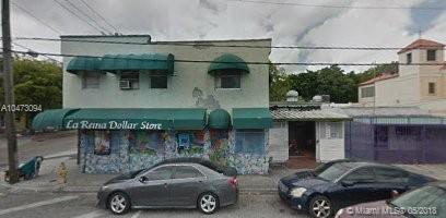 Corner property being sold together with adjacent property located at 211 NW 31st Street, Miami, Florida 33127 which is included as part of the listing price. An excellent development opportunity in the Midtown area. The combined lots are approximately 12,450 square feet.