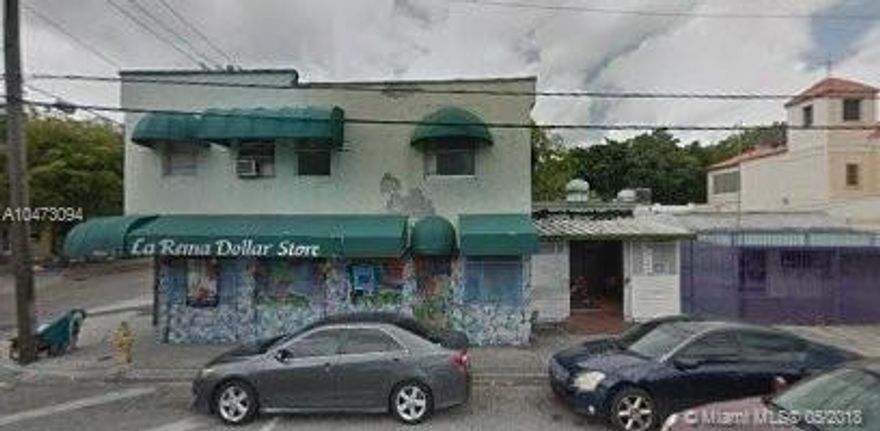 Corner property being sold together with adjacent property located at 211 NW 31st Street, Miami, Florida 33127 which is included as part of the listing price. An excellent development opportunity in the Midtown area. The combined lots are approximately 12,450 square feet.