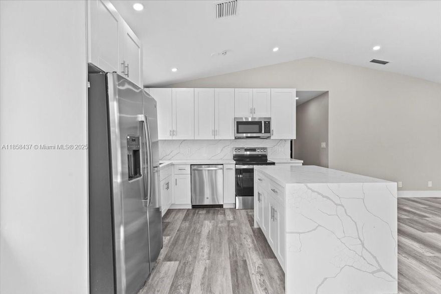 Location, lifestyle, and like-new finishes! Fully renovated 4BR/2BA single-family home features a 2025 roof, new impact windows, luxury LVP flooring, granite counters with a waterfall island, and an airy open living/dining layout. Convenience upgrades include a top-load washer/dryer. Step outside to an oversized, leisure-ready backyard fenced with PVC—perfect for pets, play, and entertaining. Prime South Miami location near the Florida Turnpike, the University of Miami (about 1.2 miles), and upscale Shops at Merrick Park—plus dining, parks, and a walkable downtown vibe. Move-in ready and made for modern living.