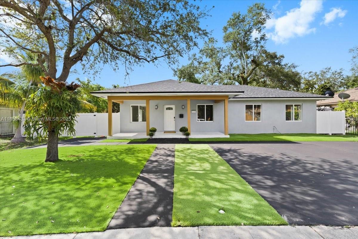 Location, lifestyle, and like-new finishes! Fully renovated 4BR/2BA single-family home features a 2025 roof, new impact windows, luxury LVP flooring, granite counters with a waterfall island, and an airy open living/dining layout. Convenience upgrades include a top-load washer/dryer. Step outside to an oversized, leisure-ready backyard fenced with PVC—perfect for pets, play, and entertaining. Prime South Miami location near the Florida Turnpike, the University of Miami (about 1.2 miles), and upscale Shops at Merrick Park—plus dining, parks, and a walkable downtown vibe. Move-in ready and made for modern living.
