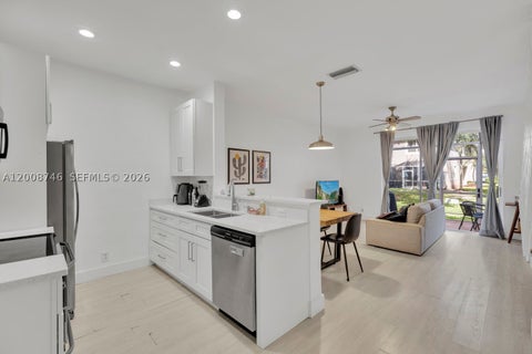 Photo of 1919 Madeira Dr #4, Weston, FL 33327 (MLS # A12008746)