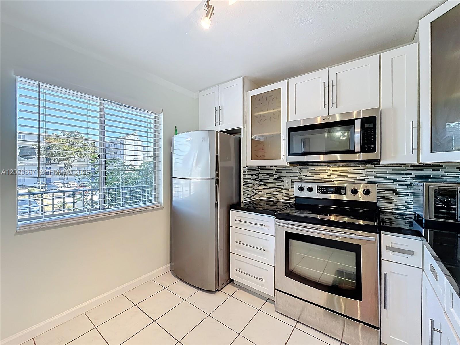 8740 N Sherman Cir 206 - Image 1