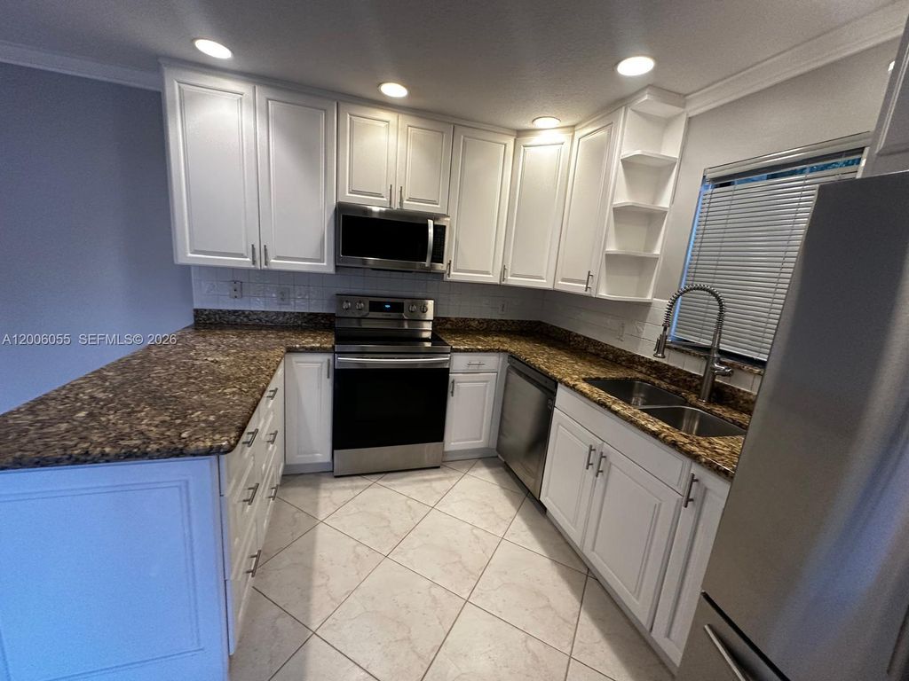 Photo of 7671 W Courtyard Run W, Boca Raton, FL 33433 (MLS # A12006055)