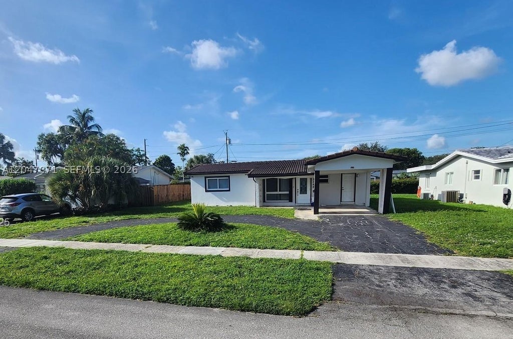 Photo of 3346 Coolidge St, Hollywood, FL 33021 (MLS # A12047071)