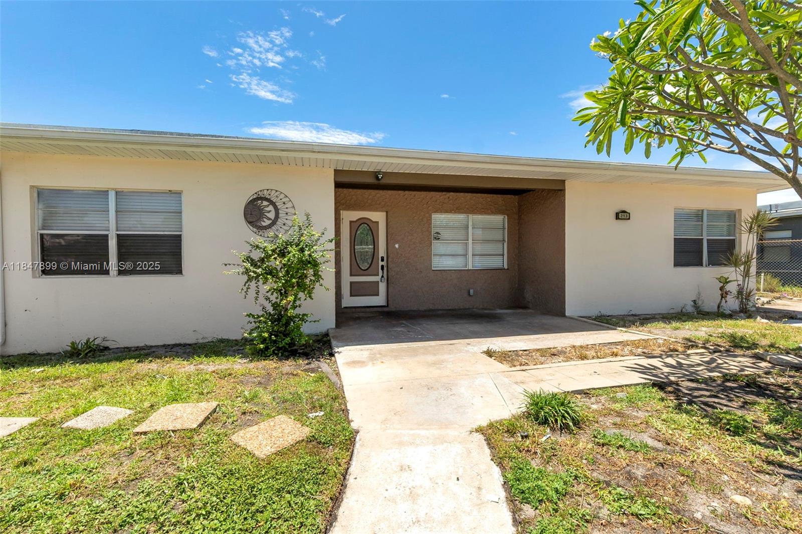 Come see this charming single-family home situated on an oversized lot in the Broward Park community of Fort Lauderdale. This property offers a spacious split floor plan with 3 generously sized bedrooms and 2 bathrooms. The updated kitchen features rich wood cabinetry, granite countertops, and stainless steel appliances. Enjoy modern laminate wood flooring throughout and a freshly painted exterior. Step outside to a fully fenced yard with plenty of space for outdoor entertaining. Centrally located near major highways and lots of shopping and dining options. No HOA!