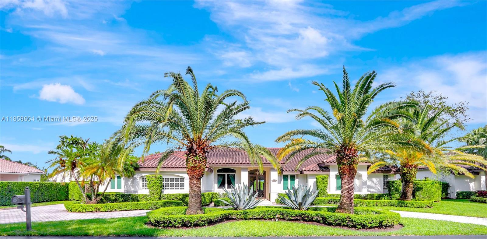 Newly Listed! Priced to Sell. Nestled within the serene, private gates of Poinciana Gardens off Sunset Drive, this exquisite 6-bedroom, 5-bath residence defines gracious Florida living. Elegant indoor-outdoor living is enhanced by abundant natural light, marble floors and elegant finishes. The center of the home, a gourmet kitchen, features upscale appliances, ample counter space designed for both cooking and entertaining. It has an in-law suite for guests or extended family, while the large, covered terrace invites gatherings with a flow to a sparkling pool set amid lush landscaping. Every aspect of this home from its architecture to its layout evokes an upscale, luxurious lifestyle. Truly a one-in-a-million home offering resort-style living in the exclusive Poinciana Gardens.