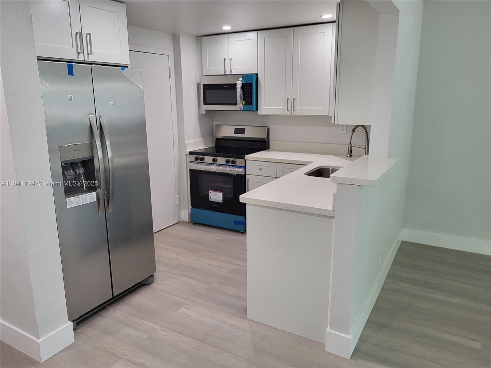 Location Location, Corner Unit 3 Bedrooms 2 Bathrooms New Kitchen with Quartz Tops, Stainless Steel New Appliances New Bathrooms with Quartz Tops and New Flooring, Freshly Painted, Impact Window, Water included, Pool Area, New Elevators, 2 Assigned Parking Spaces, 5 Minutes to Dadeland Mall Shops, Publix and many Restaurants, Metro Rail Transit and 10 minutes from South Miami Restaurants.