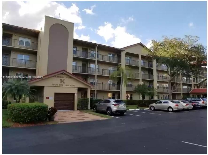 Resort style living in most desirable Pembroke Pine Community. This 2/2 bathroom has been updated beautifully,brand new kitchen with gorgeous granite countertop,bathroom have been updated and modernized, wooden floors in bedrooms and ceramic tile throughout living areas. Washer and dryer in unit. Balcony with view to the wonderful gulf course also available for you entertainment. Spectacular clubhouse with great amenities .This property is a 55+ community per association.