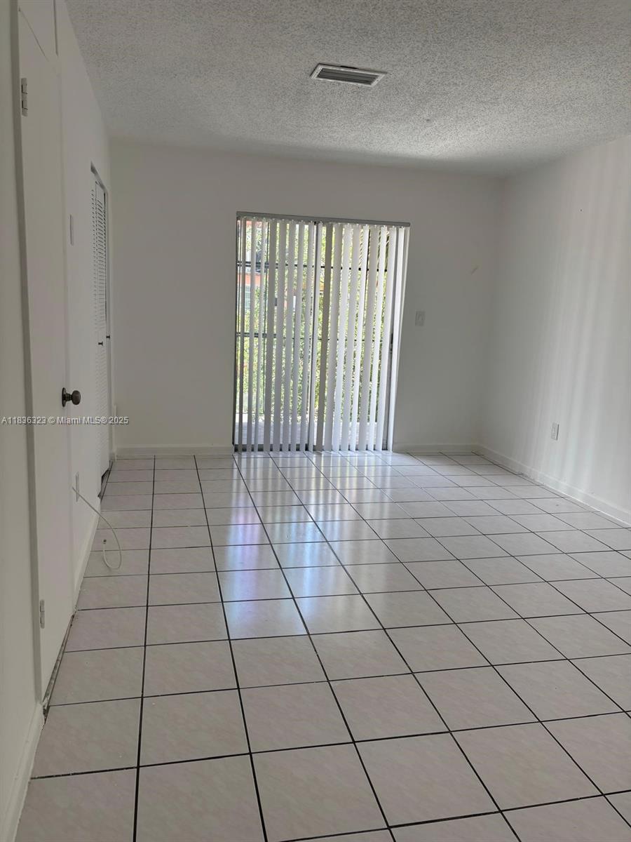 Spacious Two-Story 2 Bedroom Unit on the Upper Level!
Both bedrooms are located on the second floor, which features recently installed luxury vinyl tile (LVT) flooring. The first floor includes a convenient half bathroom and is finished with ceramic tile throughout. One assigned parking space is included. Please note, the landlord requires verification of current and past income, bank statements, and rental history. According to the property manager, a second vehicle may be parked at the school across the street — this information must be verified with the association.