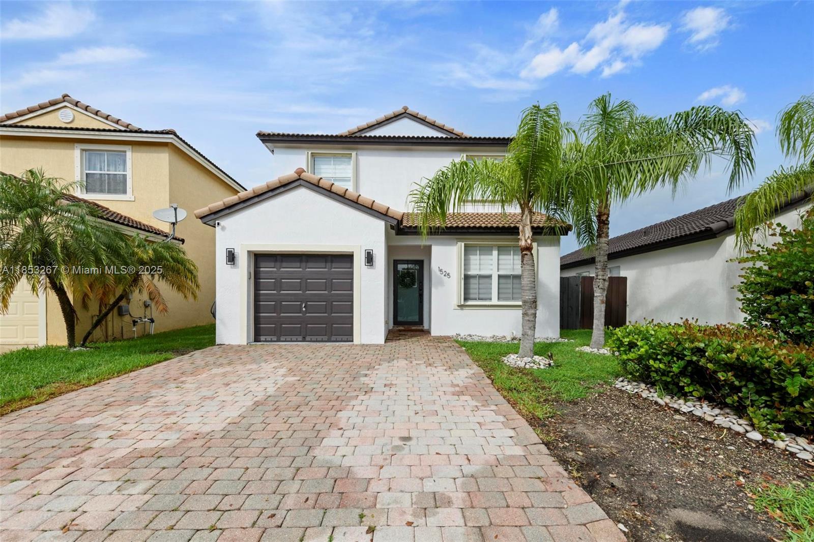 Beautiful 3-bedroom, 2-bath home in the gated Shores at Keys Gate community in Homestead. This spacious single-family home features a modern kitchen with stainless steel appliances and stunning quartz waterfall countertops. With a comfortable open layout and a very updated, turnkey-ready interior, it’s perfect for immediate move-in. The primary suite includes a private bath, and the home is equipped with central A/C, a washer and dryer, and a one-car garage. Enjoy a fully fenced backyard ideal for relaxing or entertaining. Conveniently located near shops, restaurants, and with easy access to major roads and the Florida Keys.