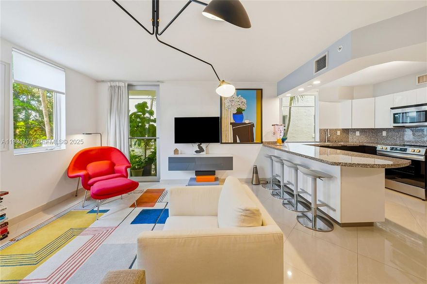Contemporary South Beach gem! Bright, private, and quiet corner residence with great natural light and a balcony. This modern condo offers an open kitchen, impact windows, in-unit washer and dryer, and one assigned covered parking space. Rare find in the heart of South Beach on a charming street just steps to restaurants, shopping, and the beach. Enjoy the energy of SoBe while living in a secure, modern boutique building (built in 2003) with rooftop access and plenty of nearby amenities. A must-see for the chic, active South Beach buyer.