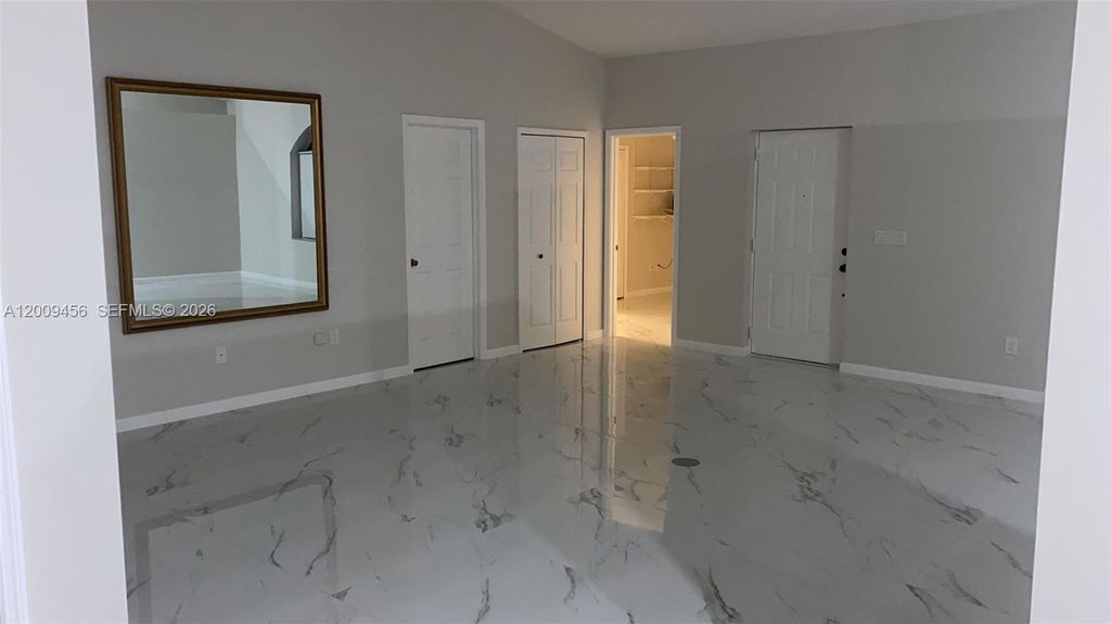 Photo of 1198 SW Ingrassina Ave, Port St Lucie, FL 34953 (MLS # A12009456)