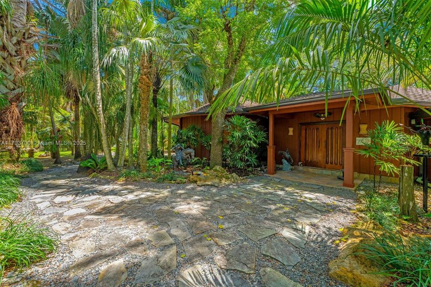 THE LOCATION DOESN'T GET ANY BETTER THAN THIS.THE COMPOUND IS UNIQUE, DESIGNED TO BRING THE OUTSIDE IN AND VICE VERSA. CUSTOM ENGINEERED 1996 4/4 IS 3,051 SQ FT WITH CYPRESS T & G CEILINGS, FIR TO BLEND IN AND IT DOES! THE LIVING AREAS ALL OPEN THRU A WALL OF GLASS AND ARE LINED WITH STONE PATIOS FOR OUTDOOR LIVING. VERY TOWN AND COUNTRY. THE FRONT IS LOADED W TROPICAL SPECIMENS, LAWN ART AND COLORFUL FLOWERING PLANTS. THE WALKWAYS THRU OUT THE PARK LIKE SETTING IS A DAY ON VACATION. THE BACK LEADING TO STABLES AND OPEN PASTURES ARE LINED WITH STATUESQUE OAKS AND SETS THE TONE FOR THE EQUESTRIAN EXPERIENCE. NO DETAIL WAS SPARED FROM THE CHEFS KITCHEN W/ BUTCHER BLOCK TO THE PRIVACY FACTOR WHERE THE GUEST WING IN REACHED VIA A COVERED OPEN BREEZWAY THRU THE LUSH WELL LIT LANDSCAPING.