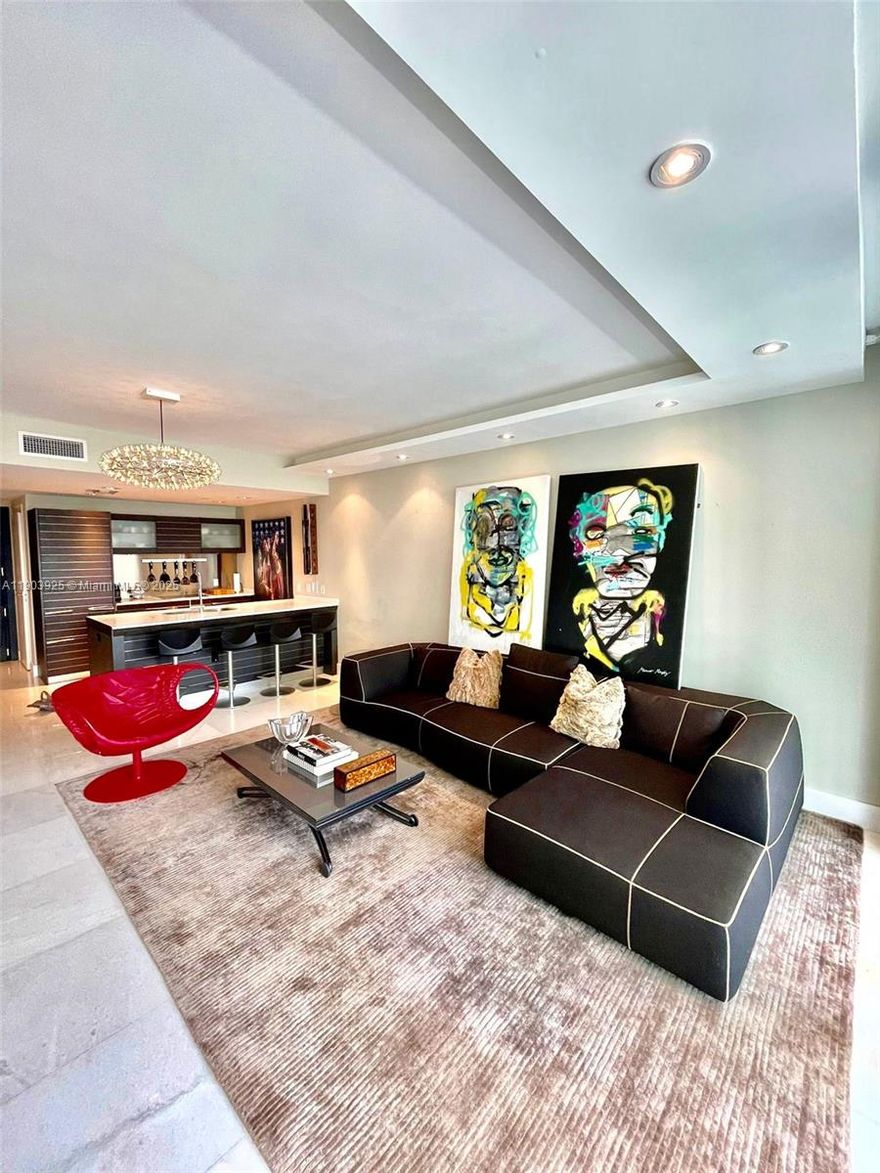 Unique unit at the Epic with very high-quality upgrades. Upgrades white carrara marble imported from Italy, drop ceiling with upgraded lighting, custom-built Italian closets, custom window treatments, built in surround sound, custom wallpaper. Unit has been owned by the same owner since pre-construction.