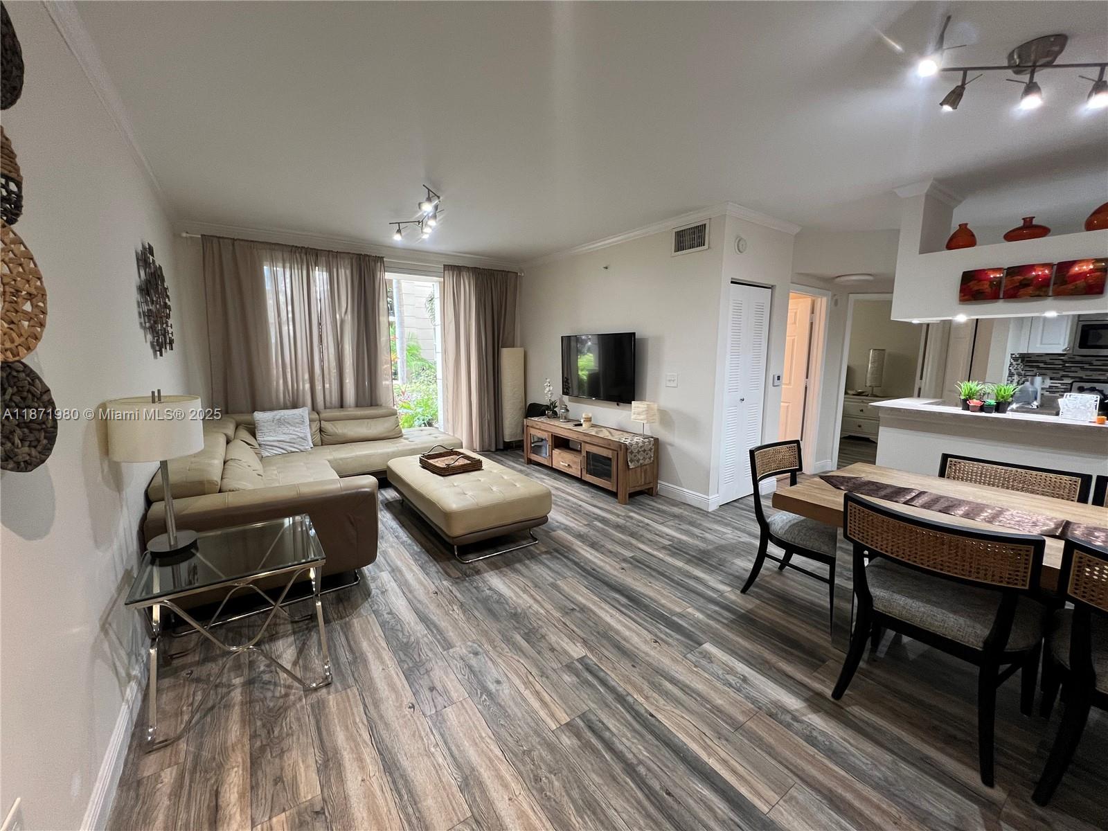 A true gem! Beautifully furnished and ideally located on the 1st floor, just steps from all the resort-style amenities. This is the largest 1BR/1BA in the community, featuring partial Intracoastal views, stunning flooring throughout, and an updated kitchen and bath. Includes a brand-new dining set and a new king-size bed with fresh bedding. Relax on your private balcony overlooking the Intracoastal and your own peaceful garden — the perfect spot to enjoy breathtaking sunsets. The community offers luxury amenities including 2 swimming pools, jacuzzis, a 24-hour gym, yoga room, business and conference centers, and an elegant clubhouse with bay views. All within walking distance to the beach, local markets, restaurants, and more. Vacant and easy to show. 2-person max occupancy. Call today!