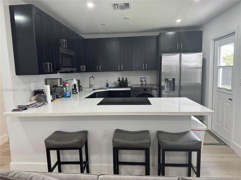 Photo of 2608 NW 3rd St, Pompano Beach, FL 33069 (MLS # A12022651)