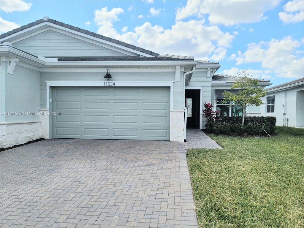 Photo of 11534 SW Viridian Blvd #11534, Port Saint Lucie, FL 34987 (MLS # A11541578)