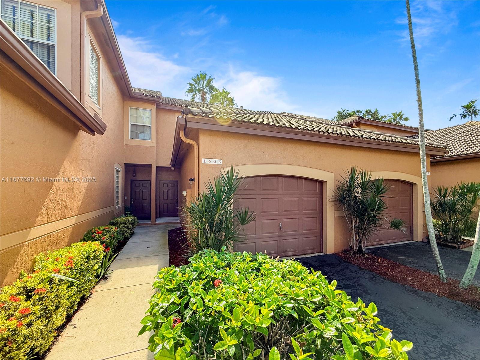Renovated 2-bedroom, 1.5-bathroom townhome in the desirable San Sebastian community of Weston. This home features a modern kitchen with white cabinetry, granite countertops, stainless steel appliances, and contemporary finishes, along with a spacious layout and wood laminate flooring throughout. Additional highlights include updated bathrooms, accordion hurricane shutters, a private patio, and a one-car garage with washer & dryer plus a driveway that accommodates two additional vehicles. Community amenities include a pool, playground, and landscaped common areas. Conveniently located within walking distance to A-rated schools, parks, and libraries, with easy access to I-75, shopping, dining, Fort Lauderdale Airport, and the beaches. Won't Last!