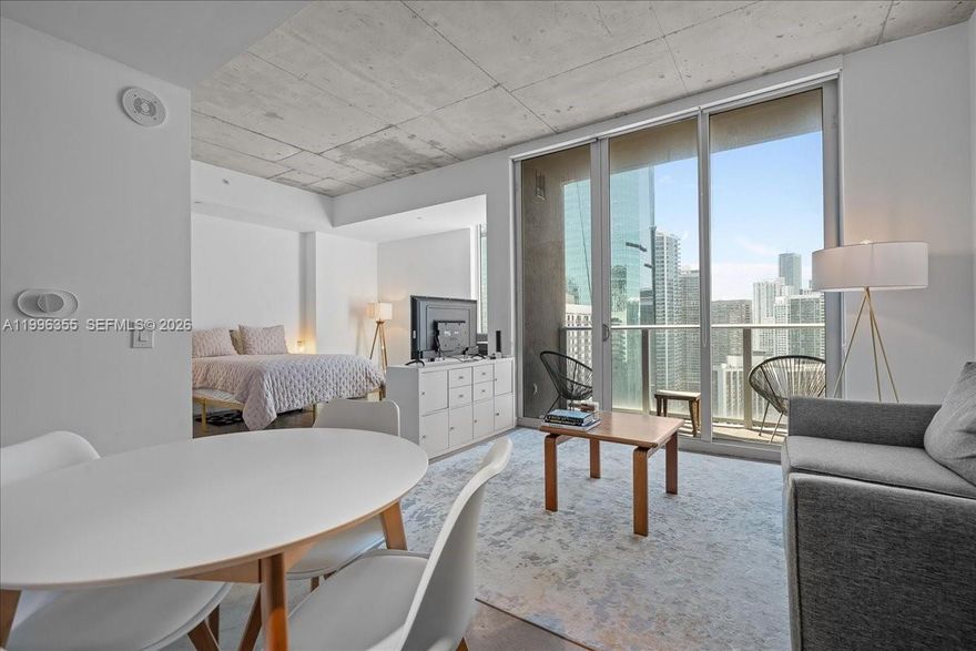 Experience Downtown Miami living in this stunning open-plan loft with soaring 12-foot ceilings and breathtaking 31st-floor views. More than just a home, it’s a great opportunity for both end users and investors, especially with Miami’s 2026 marquee sporting event approaching.  The unit is sold fully furnished and stocked—from pillows to kitchenware—making it truly move-in or rent-out ready from day one. Located close to the Brightline, Metrorail, major highways, and everything Downtown and Brickell have to offer, from dining and shopping to nightlife.  The building allows up to 12 leases per year, giving you flexibility as an investor. Residents also enjoy a rooftop clubhouse with city views, a resort-style pool, a fitness center with sauna and steam rooms, and 24-hour security.