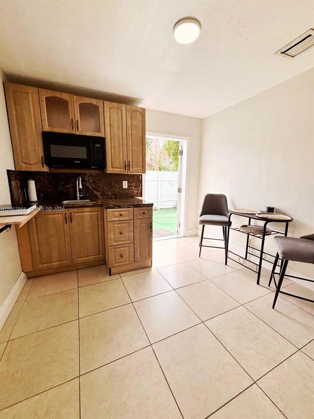 Photo of 6870 SW 5th Ct #A, Pembroke Pines, FL 33023 (MLS # A12007865)