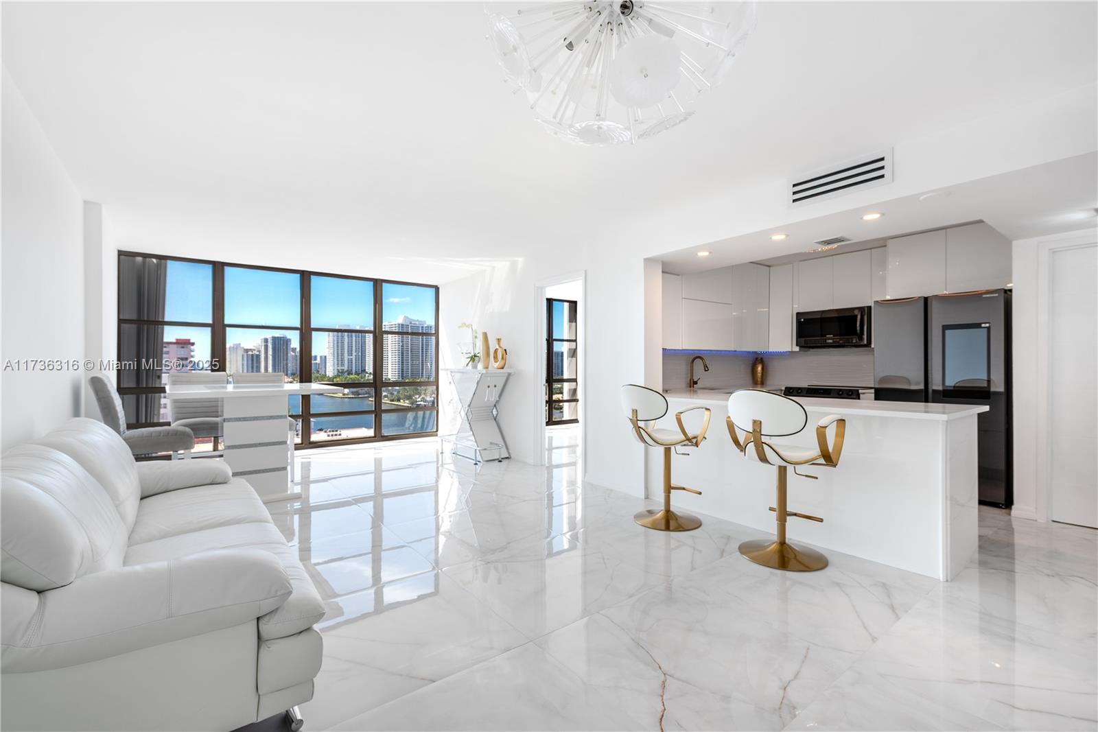 Brand new renovated modern fully furnished with new Italian furniture condo. Impeccably remodeled one of a kind, ultra modern 2/2 w/breathtaking ocean & intracoastal views directly across the street from the beach. No expense spared in this impressive professionally designed. Professionally furnished with modern Italian furniture, Hi-Tech Kitchen appliances, Premium European-designed cabinetry & elegant stone countertops. Beautiful Stone-topped vanities and hand picked designer fixtures. Spa-inspired shower with wall-mounted handheld spray & large rain shower. Lavish yourself with luxury & design. Amenities include, Pool and BBQ area, Tennis court, party, game and billiard rooms, impressive gym with newer equipment. Very Low monthly MAINTENANCE. Very easy to show!