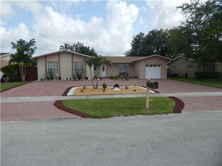 BEAUTIFULLY REMODELED 4/2 HOME*BRAND NEW ROOF*BRIGHT AND SPACIOUS OPEN PLAN CONCEPT*BRAND NEW KITCHEN AND BATHS*GRANITE COUNTER TOPS*NEW APPLIANCES*TILED THROUGHOUT*LOVELY CIRCULAR DRIVEWAY*LARGE FENCED IN YARD,GREAT FOR ENTERTAINING*CENTRALLY LOCATED NEA R A+SCHOOLS AND HIGHWAYS* FENCED YARD*NO HOA*MUST SEE TO APPRECIATE THIS SPECTACULAR HOME*