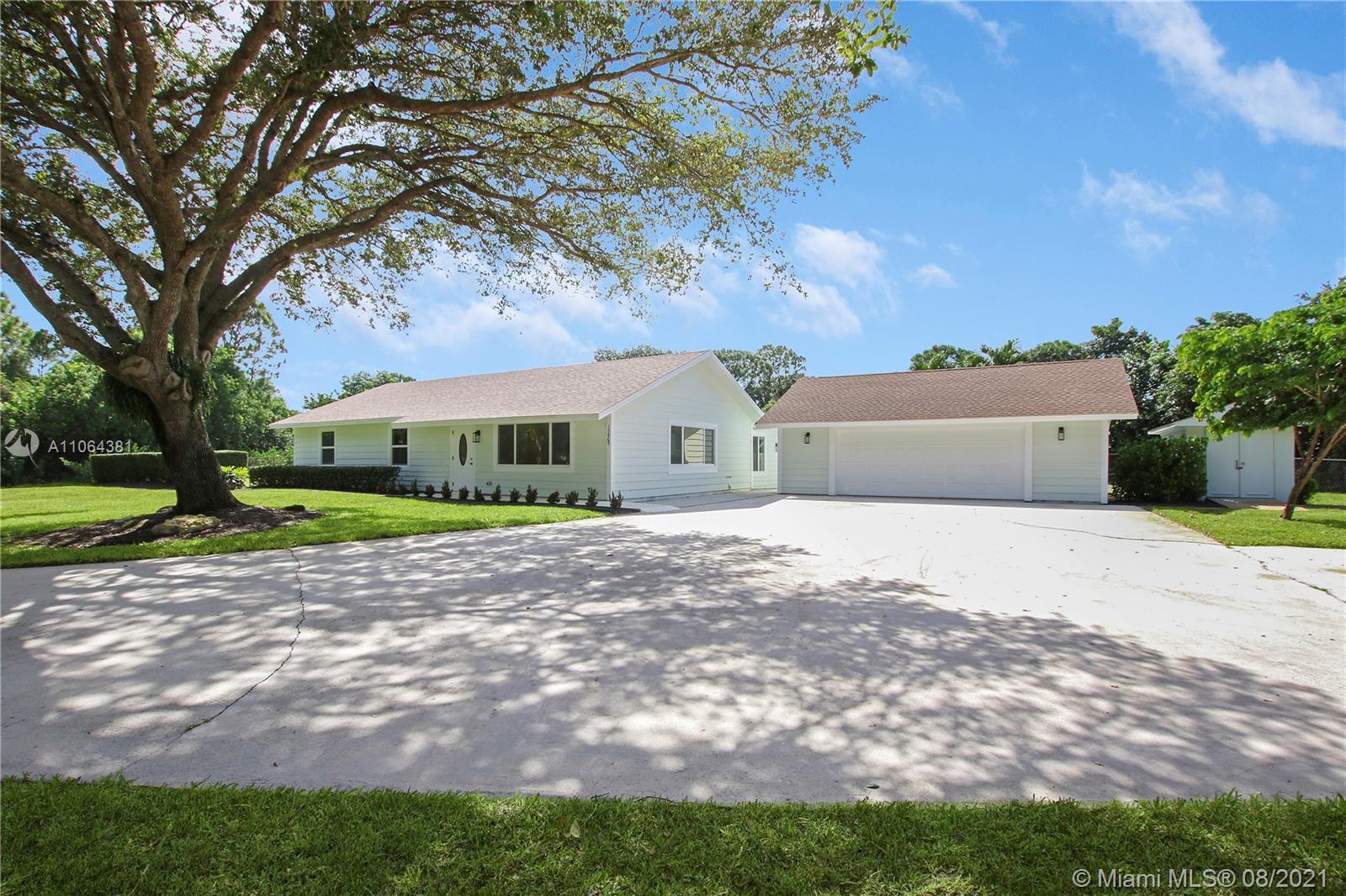 Beautifully Remodeled 4 Bedroom 2 Bath Pool Home with an Oversized 2 Car Garage in Palm Beach Country Estates!! EVERYTHING in this House is BRAND NEW!! NEW Roof. NEW A/C System and Duct Work. NEW Impact Windows Throughout. NEW Kitchen Cabinets and Quartz Counter-tops. NEW Stainless Steel Appliances. Both Bathrooms Feature NEW Shower Tile, Vanities with Quartz Tops, Toilets and Mirrors. NEW Tile Flooring and Baseboard Throughout. NEW Interior and Exterior Doors Throughout. NEW Fans and Fixtures Throughout. NEW Electric Panel and Wiring Throughout. NEW Hot Water Heater. Custom Built Closets. Freshly Painted Interior and Exterior. NO HOA or Restrictions. This Home Has it All and is in Move-In Condition!! Must See!!