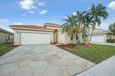 Photo of 14125 S Cypress Cove Cir, Davie, FL 33325 (MLS # A11948099)