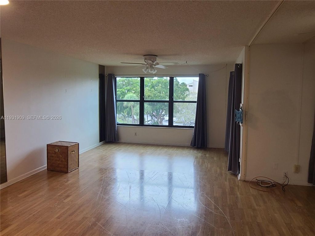 Photo of 2306 S Cypress Bend Dr #418, Pompano Beach, FL 33069 (MLS # A11931909)