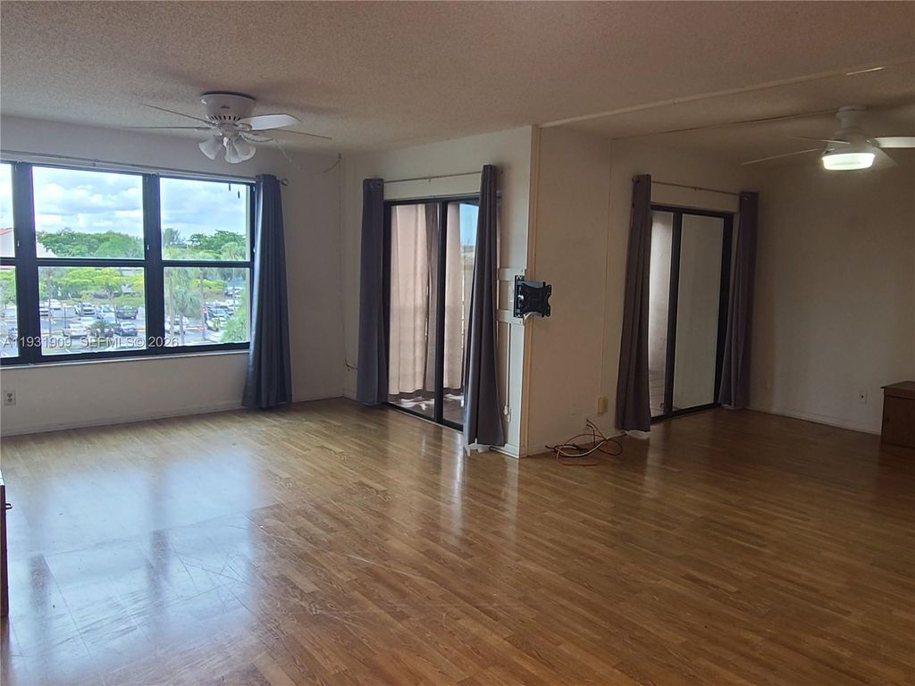 Photo of 2306 S Cypress Bend Dr #418, Pompano Beach, FL 33069 (MLS # A11931909)