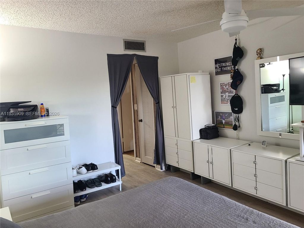 Photo of 2306 S Cypress Bend Dr #418, Pompano Beach, FL 33069 (MLS # A11931909)