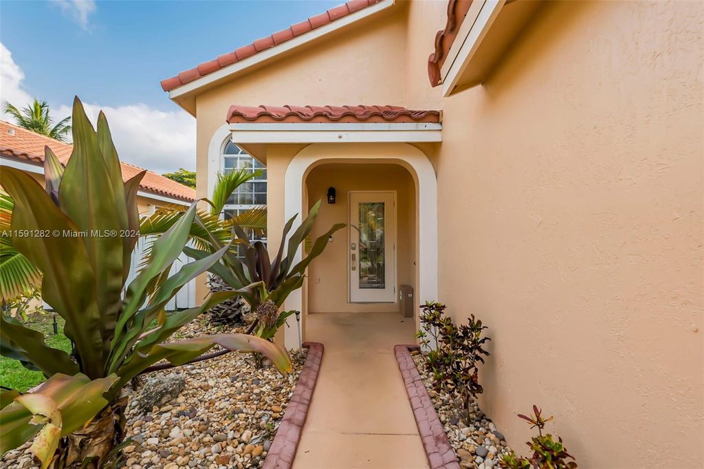 Photo of 18312 NW 7th St, Pembroke Pines, FL 33029 (MLS # A11591282)