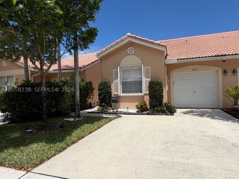Photo of 299 Coral Trace Ln, Delray Beach, FL 33445 (MLS # A12058238)