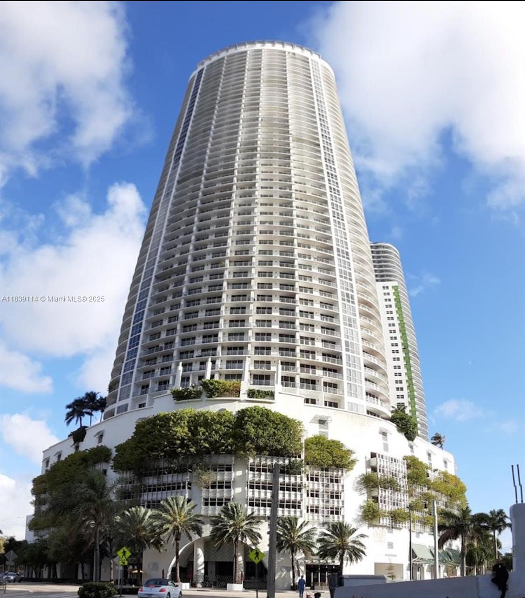 Discover the epitome of luxury living at the Opera Tower in Edgewater, Miami! This stunning 2BR,2BA penthouse, situated on the 54th floor, offers an unparalleled blend of sophistication, comfort, and convenience. Enjoy breathtaking panoramic views of the bay from the comfort of your own home. Inside, the elegant interiors are adorned with brand new flooring and appliances, creating a modern and inviting atmosphere. Residents have access to an impressive array of hotel-like amenities, ensuring a lifestyle of ease and relaxation. The prime location is just steps away from Margaret Pace Park, supermarkets, and a diverse selection of restaurants. Only minutes from the vibrant scenes of downtown Miami, Wynwood, the Design District, and South Beach.