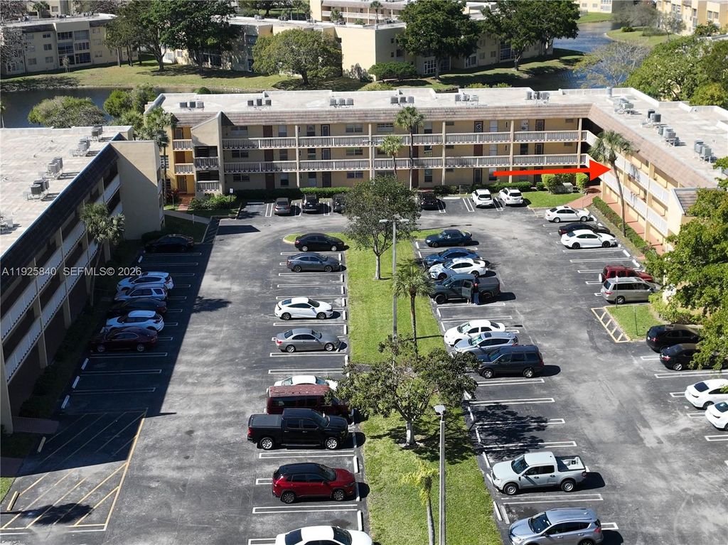 Photo of 5961 NW 61st Ave #208, Tamarac, FL 33319 (MLS # A11925840)