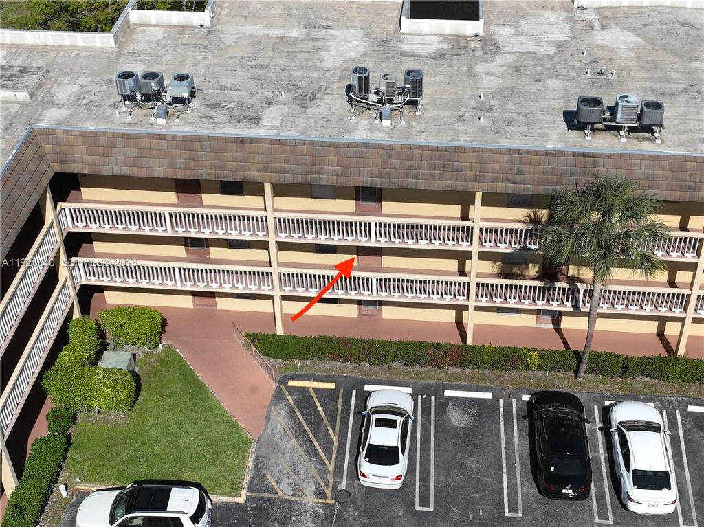 Photo of 5961 NW 61st Ave #208, Tamarac, FL 33319 (MLS # A11925840)