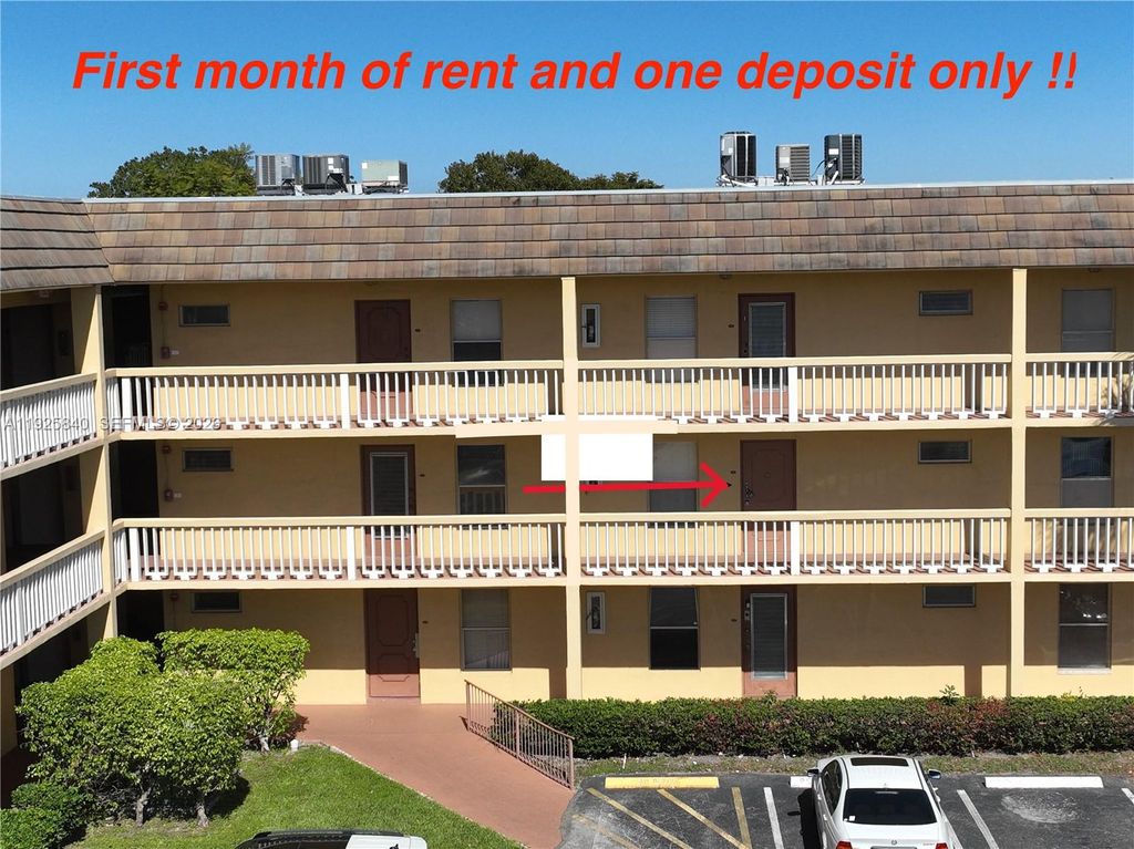 Photo of 5961 NW 61st Ave #208, Tamarac, FL 33319 (MLS # A11925840)