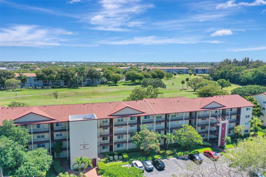 Immaculate, upgraded condo with serene golf course views located in the heart of Pembroke Pines. Situated in the sought-after 55+ Century Village community offering resort-style amenities. This bright and spacious 2-bedroom, 2-bath unit features waterproof laminate flooring throughout and no popcorn ceilings. Enjoy a clean kitchen with newer appliances, plus the convenience of an in-unit washer and dryer. The large primary suite includes a walk-in closet and private bath. Additional highlights include accordion shutters, balcony storage, and assigned parking with ample guest spaces. 24-hour guard-gated community. Ideally located near shopping and dining. Move-in ready. Sold AS-IS. Association covers water, cable, and WiFi.
