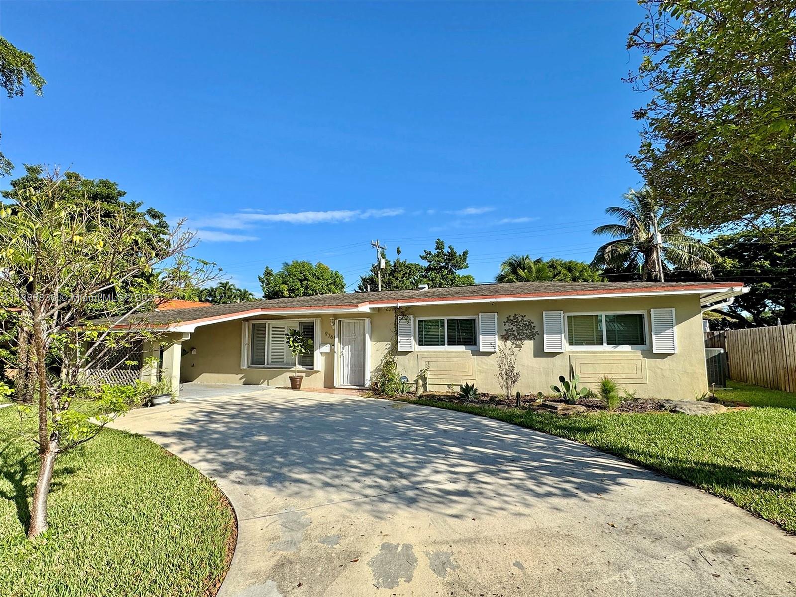 Be only the second owner of this home! Larger than most of the homes in this neighborhood, boasting a massive 540-sf "florida room" in the back that is an amazing family room, plus (potentially) a second dining area. Skylights in florida room and kitchen. Original terrazzo in the bedrooms! Just polish and go! Large laundry/utility room off the kitchen can also be pantry area. Full storm protection with a mix of impact glass and accordian shutters. All fresh water plumbing re-piped in 2002. Large backyard covered patio is completely protected with accordian shutters. Large shed with power and AC unit. Power outlet in carport for electric vehicle charging! 5 houses from Sunset Park. Super convenient access to everything, yet still a quiet neighborhood.