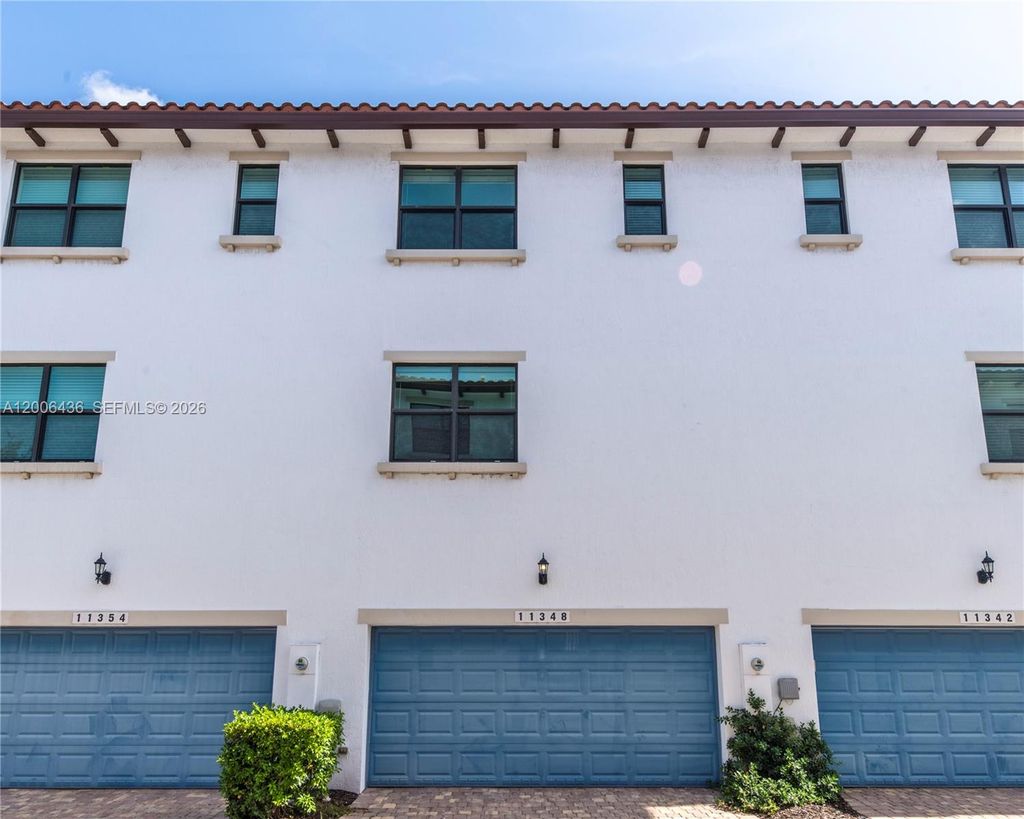 Photo of 11348 SW 14th St, Pembroke Pines, FL 33025 (MLS # A12006436)