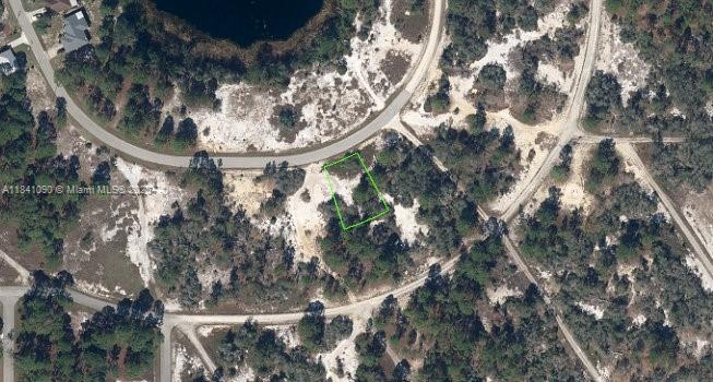 Build your dream home on this 0.23-acre residential lot located in the desirable Sun 'N Lake Estates community of Lake Placid, FL. This quiet, paved road offers easy access and a peaceful neighborhood atmosphere. The lot is high and dry with public road frontage, and utilities like electric are nearby (Duke Energy). Private well and septic will be required. No HOA or time-to-build restrictions. Great investment opportunity or future home site near lakes, golf, and local amenities.