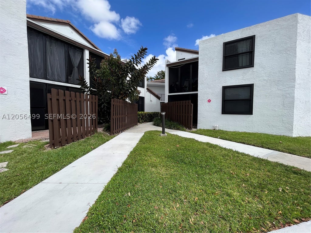 Photo of 215 Lake Pointe Dr #104, Oakland Park, FL 33309 (MLS # A12056499)
