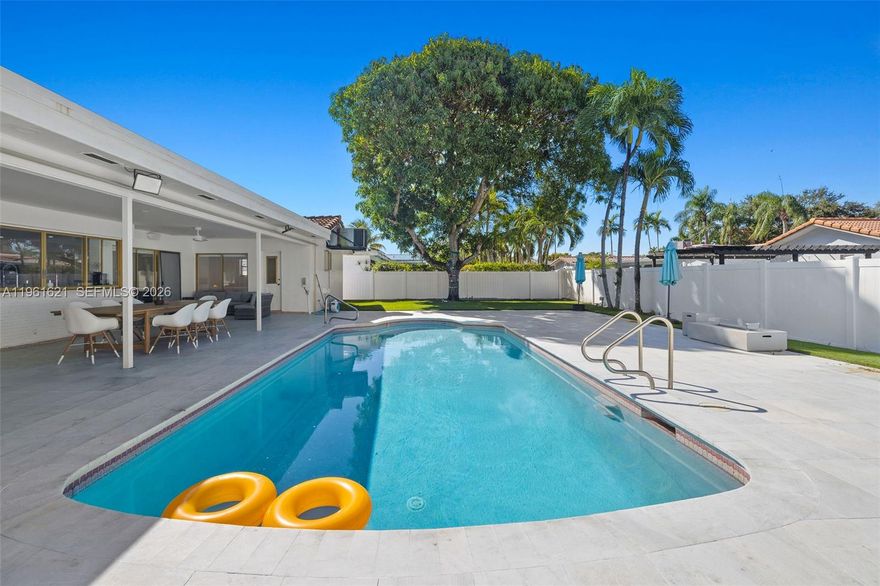 Welcome to this beautifully remodeled single-family residence located in the prestigious Emerald Hills community. Ideally positioned directly across from the golf course and park, this home offers privacy, and an unbeatable location. This spacious home features 3 bedrooms, 2 full bathrooms, plus a large den that can easily be converted into a 4th bedroom, home office, or playroom, providing flexibility to fit your lifestyle needs. The true highlight of this property is the fully remodeled outdoor living area, designed for both entertaining and relaxation. Enjoy a sparkling pool, expansive patio space, and a beautifully upgraded backyard oasis, the ultimate Florida lifestyle setting. Additional features include a brand-new roof, oversized 9,000 sq ft lot, A/C in each room , surround sound system all over inside and outside, prime location in one of the area’s most desirable neighborhoods. This home offers the perfect combination of comfort, style, and location. A rare opportunity in Emerald Hills.